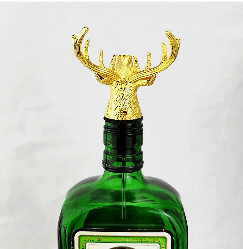 Gold metal deer head back bottle stopper image