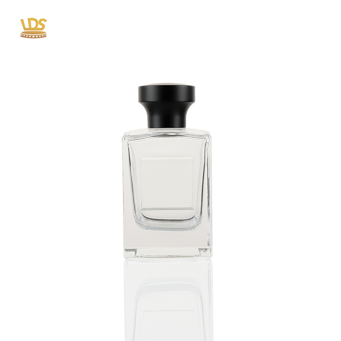 Custom luxury golden Zamac perfume cap by LDS.