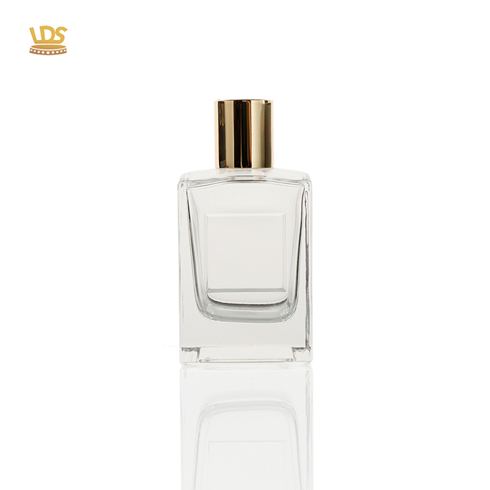 High-end perfume bottle with gold Embossing lid