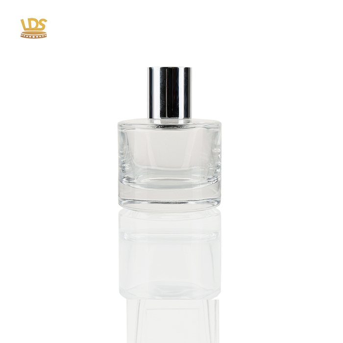 High-end perfume bottle with silver lid