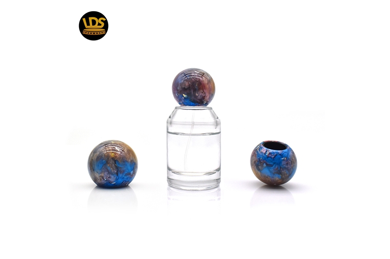 Resin perfume caps offer unique style and durability