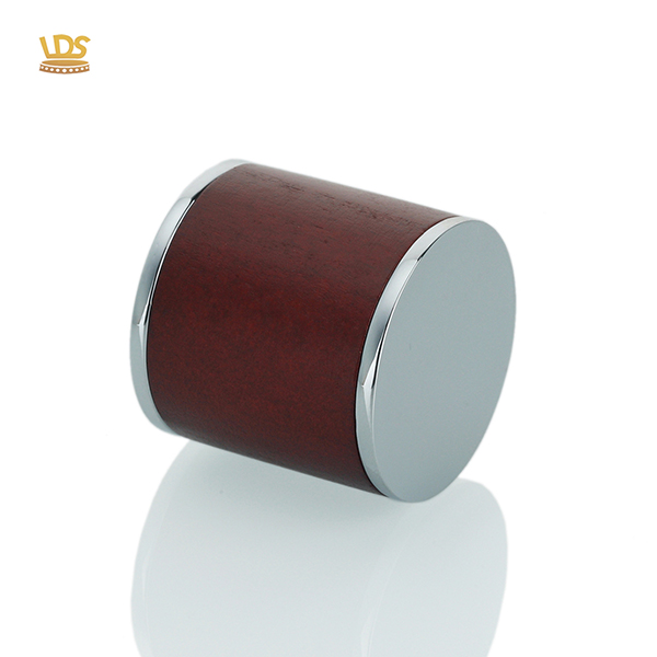 Cylindrical red wood texture zamac perfume cap with polished chrome silver metal edges.